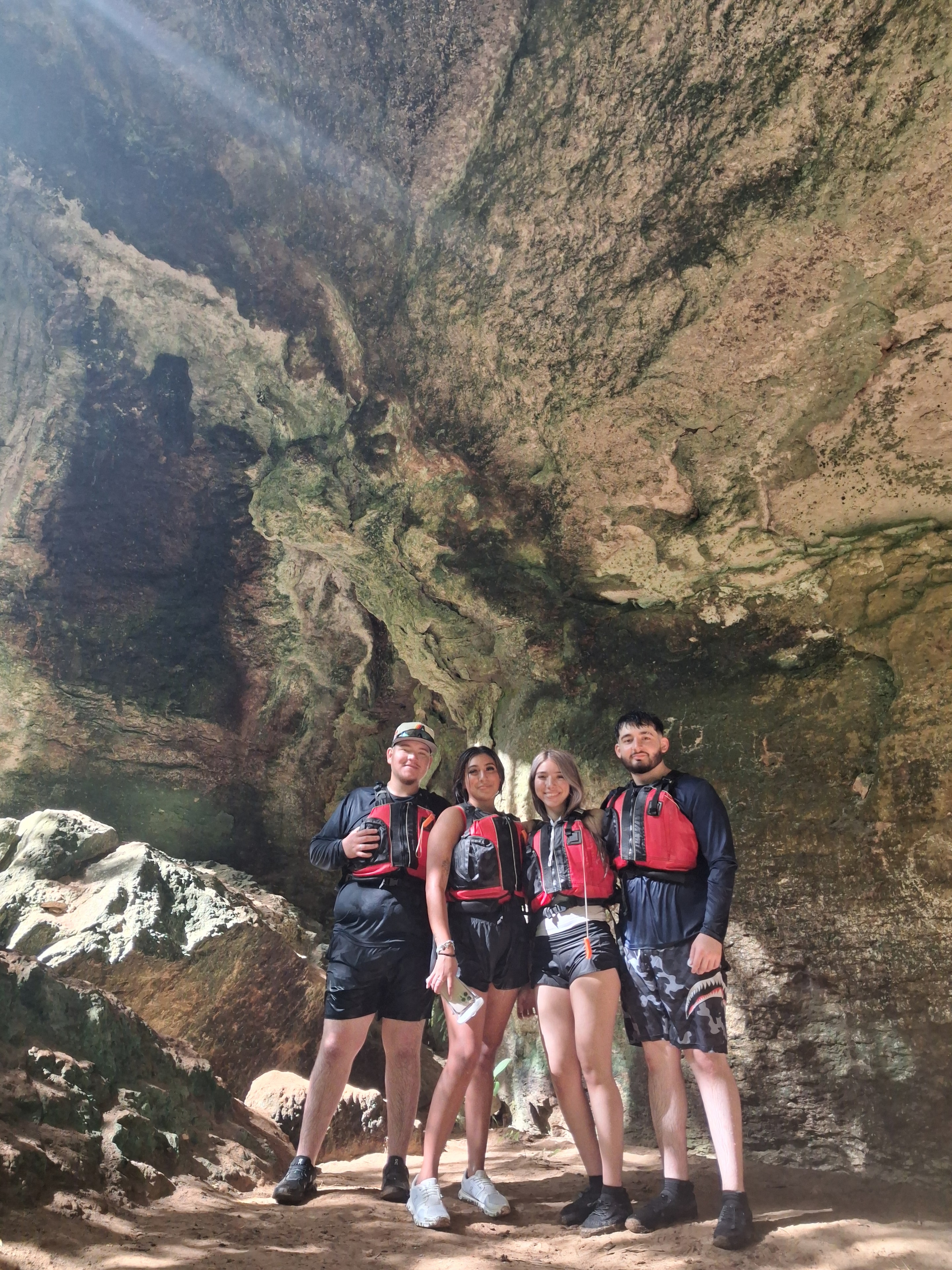 Group with headlamps deep inside the Charco Azul cave system