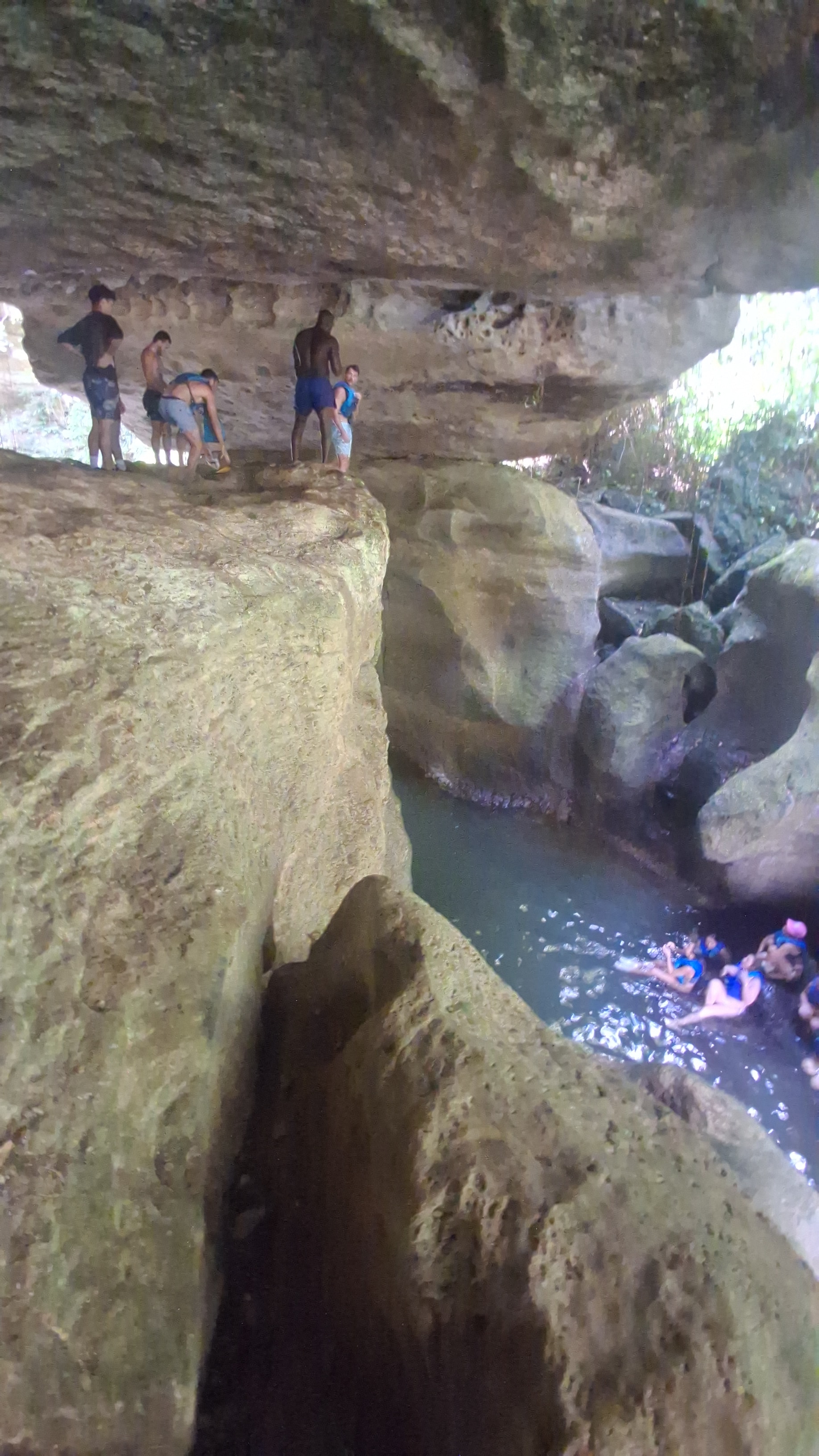 Guests exploring the karst canyon at Charco Azul