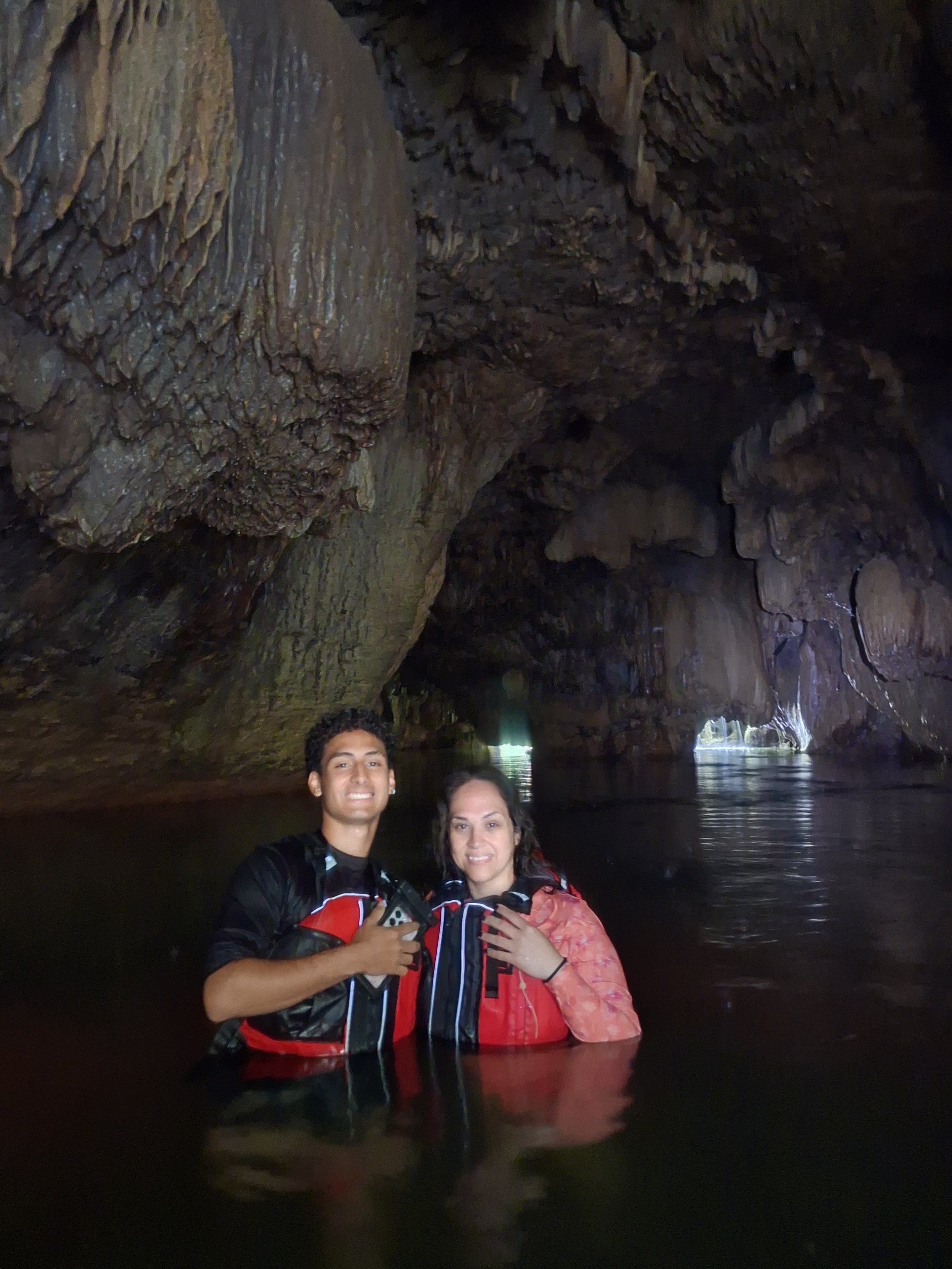 Adventurers navigating the limestone canyon trail