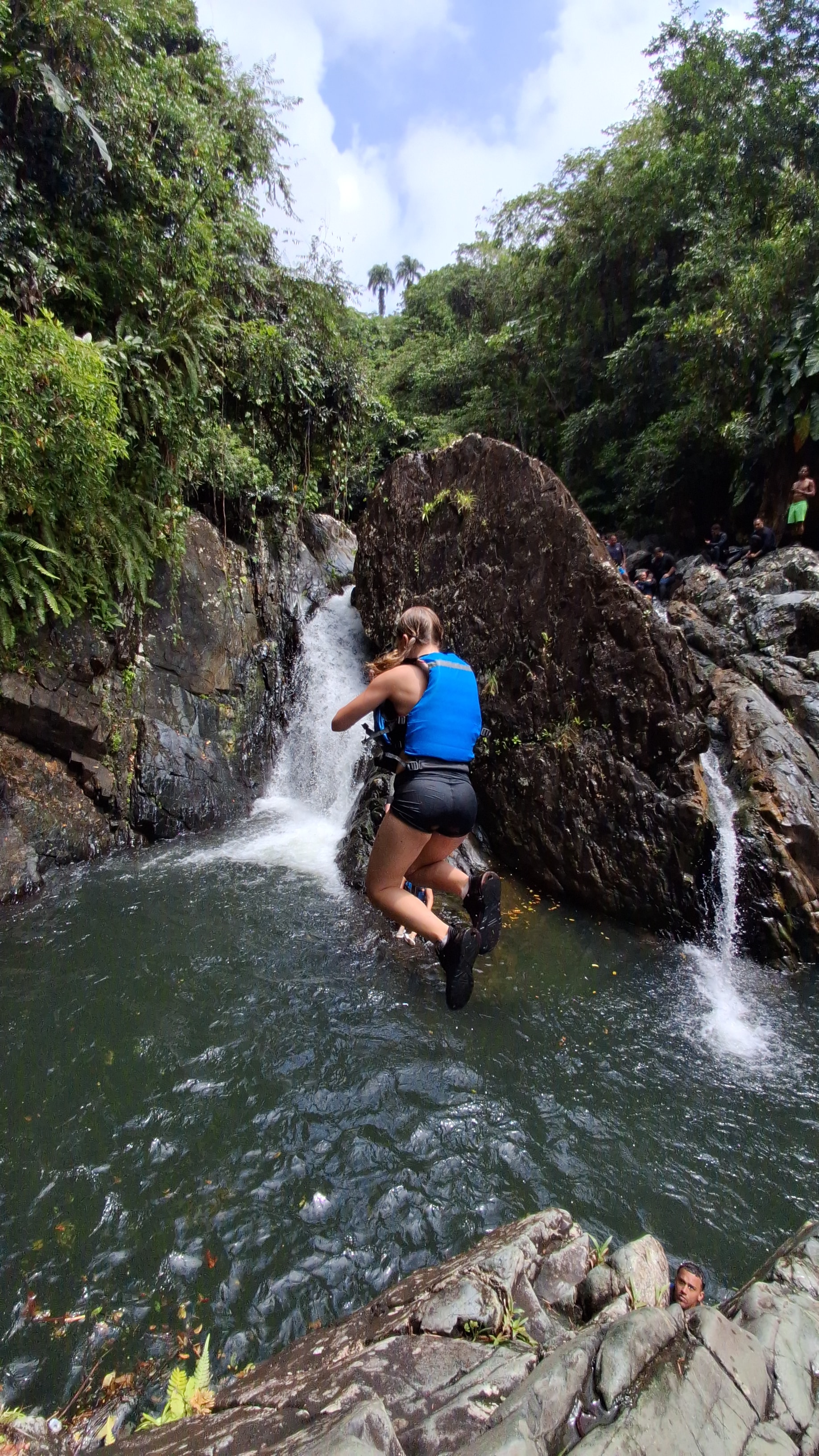 Guest sliding down the natural waterslide